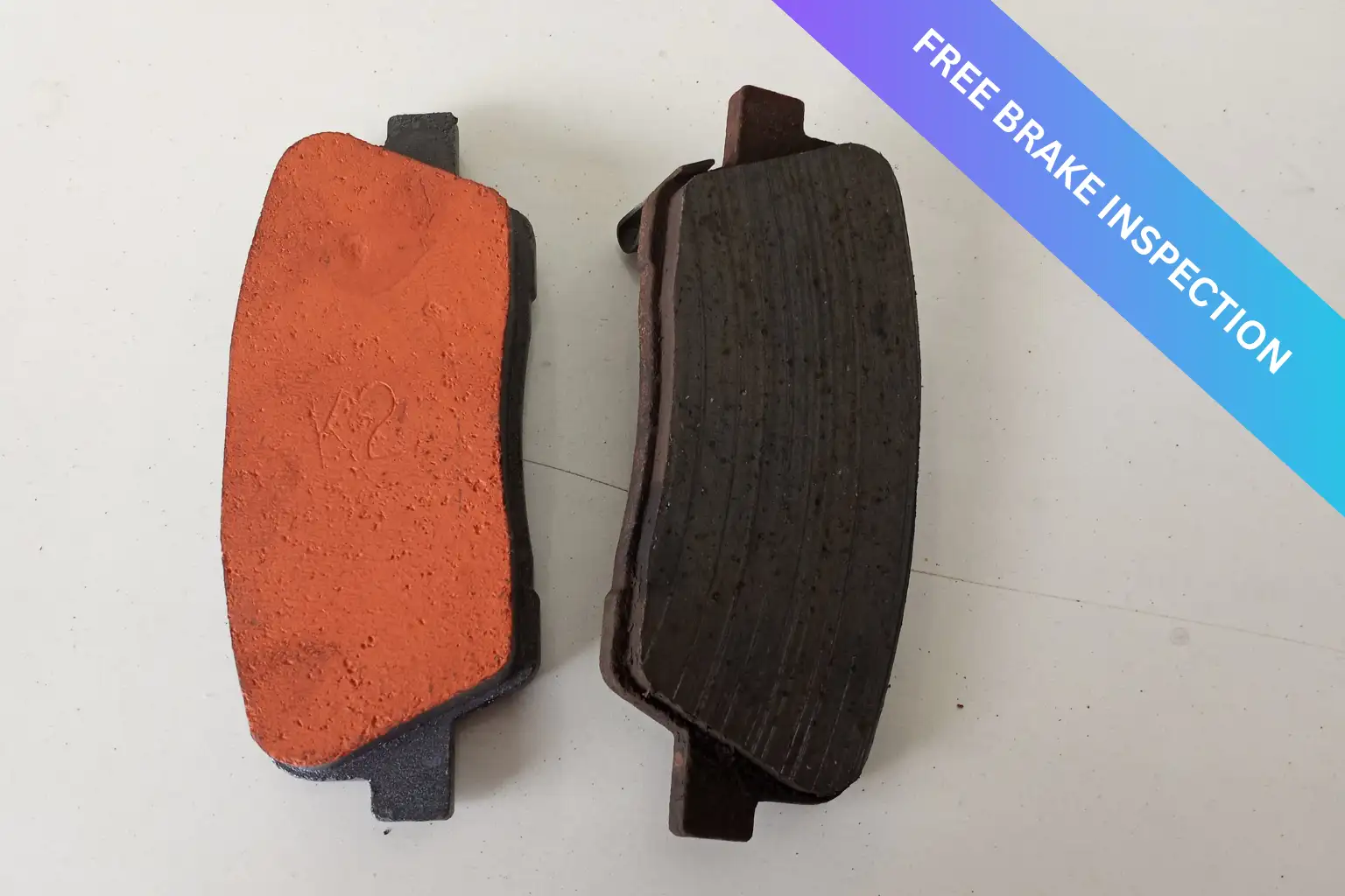 Comparison of a new brake pad and a worn brake pad